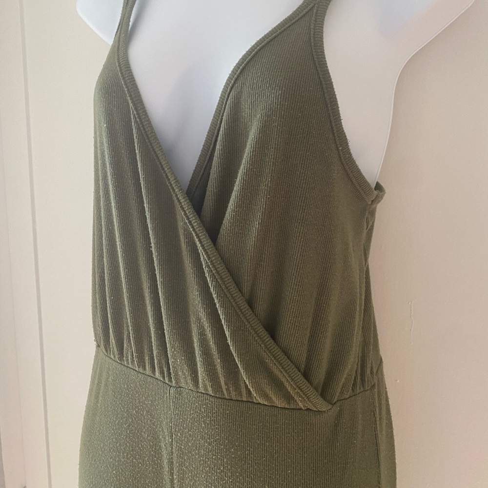 Green ribbed Romper - loose fitting with flared leg.  Women’s Size Medium